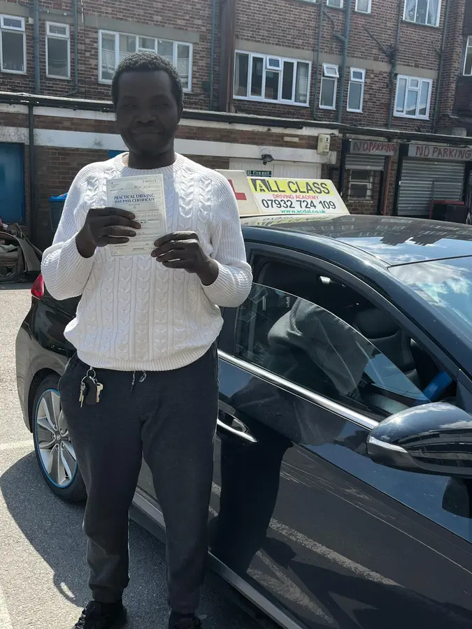 ACDAL learner celebrating a practical driving test pass 7
