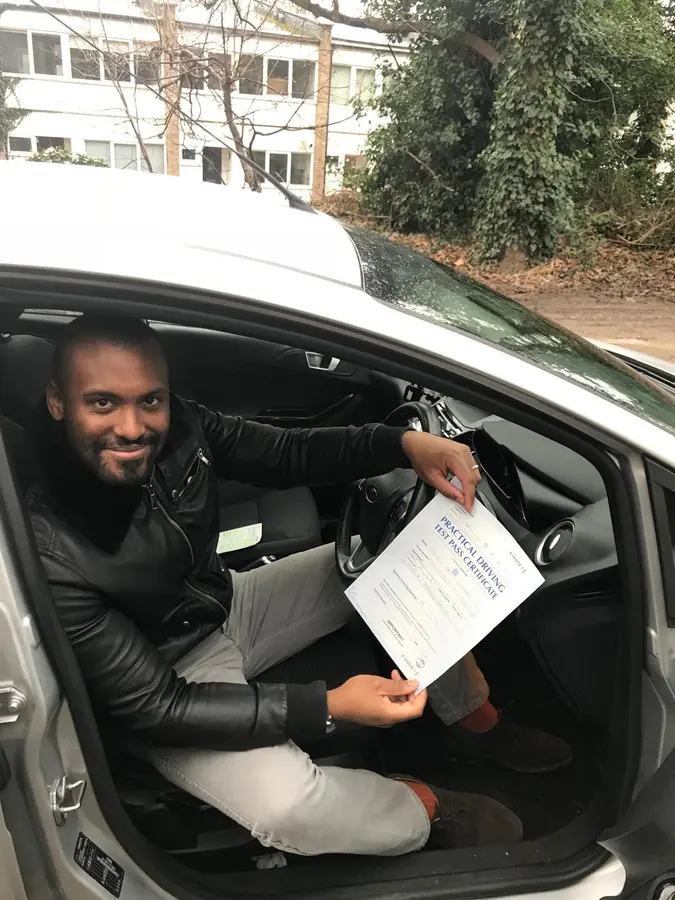 ACDAL learner celebrating a practical driving test pass 11