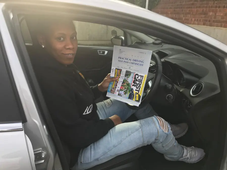 ACDAL learner celebrating a practical driving test pass 13