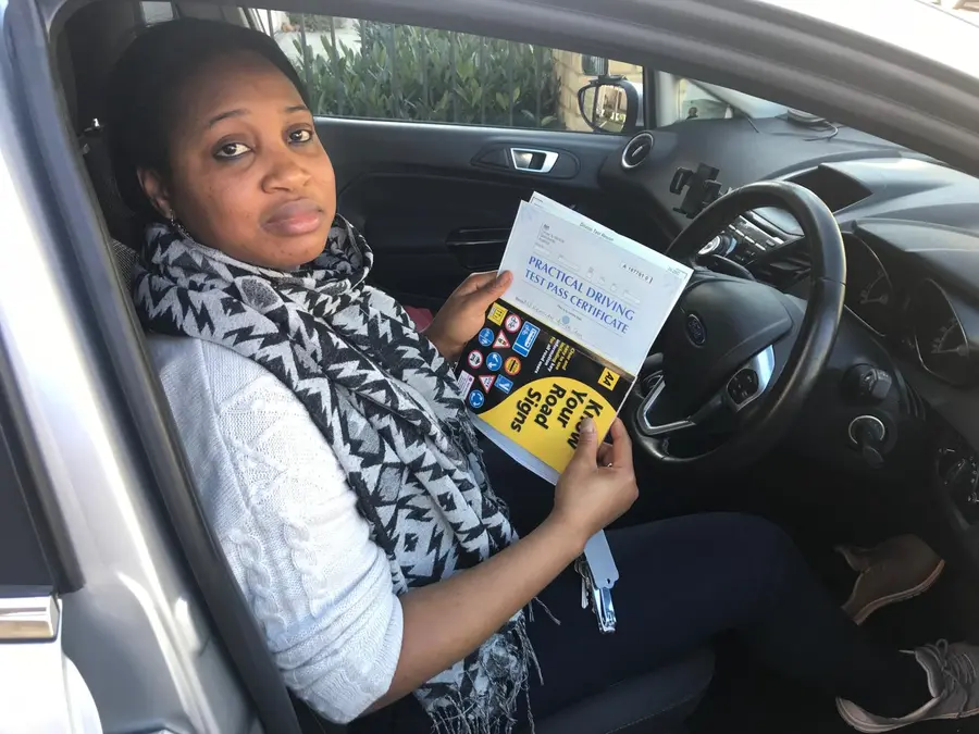 ACDAL learner celebrating a practical driving test pass 14