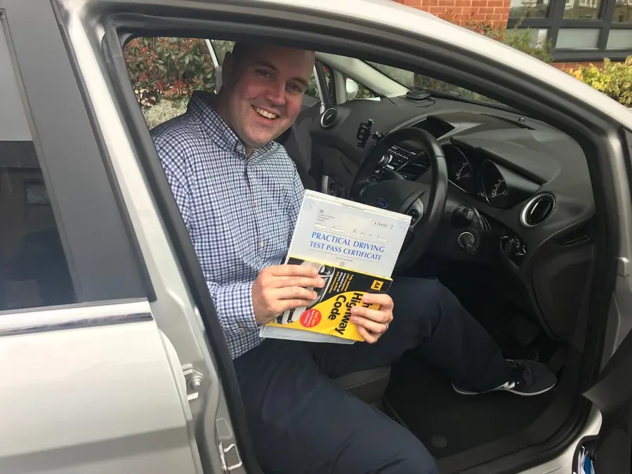 ACDAL learner celebrating a practical driving test pass 15
