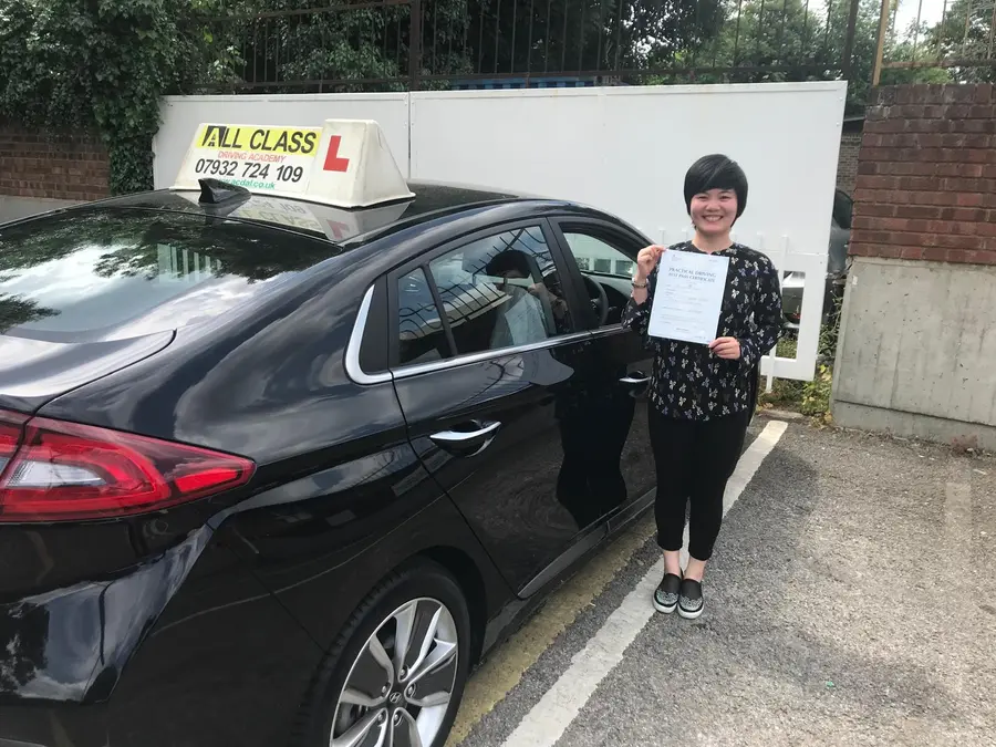 ACDAL learner celebrating a practical driving test pass 18
