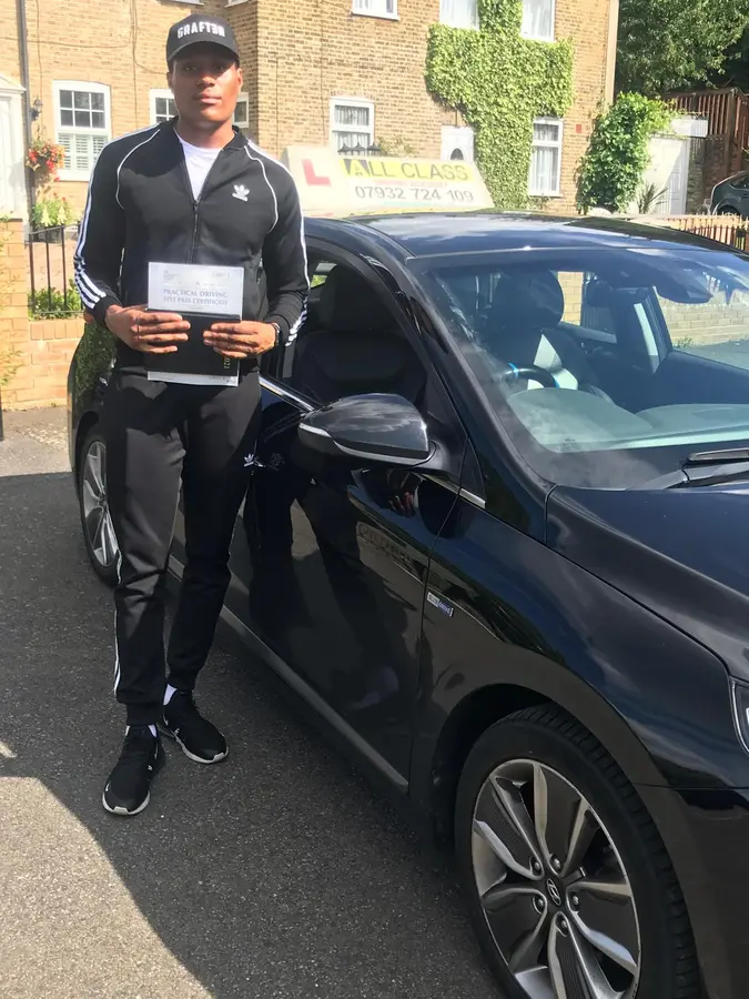 ACDAL learner celebrating a practical driving test pass 25
