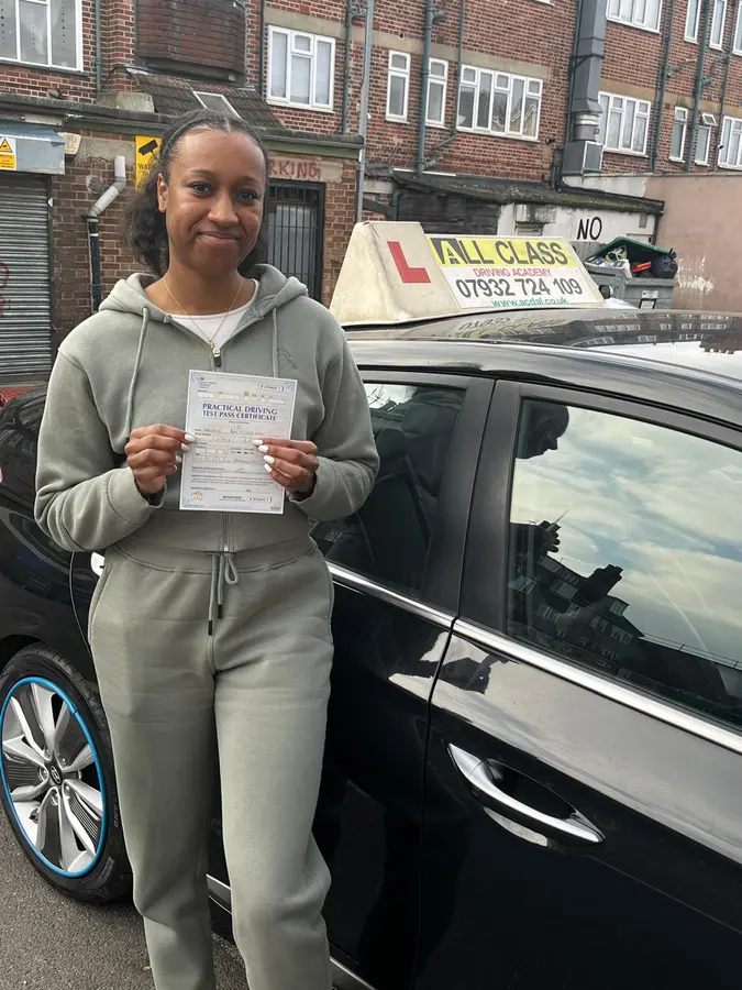 ACDAL learner celebrating a practical driving test pass 40