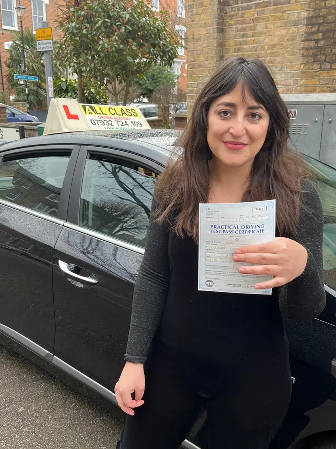 ACDAL learner celebrating a practical driving test pass 42